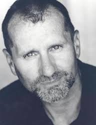 Youger Ed O’Neill looking great in a black and white photo