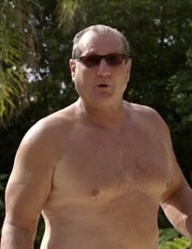 Ed O’Neill shirtless body wearing sunglasses