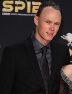 Chris Froome super elegant in a black suit and tie, and gray shirt