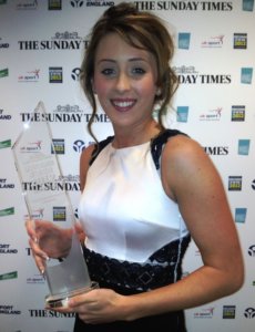 Jade Jones holding an award