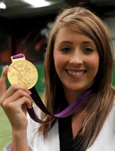 Jade Jones smiling with a gold medal