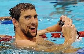 Michael Phelps smiling in a pool