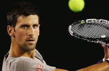 Novak Djokovic playing a tennis match really focused