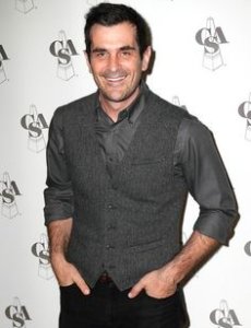 Ty Burrell smiling in a photo shoot